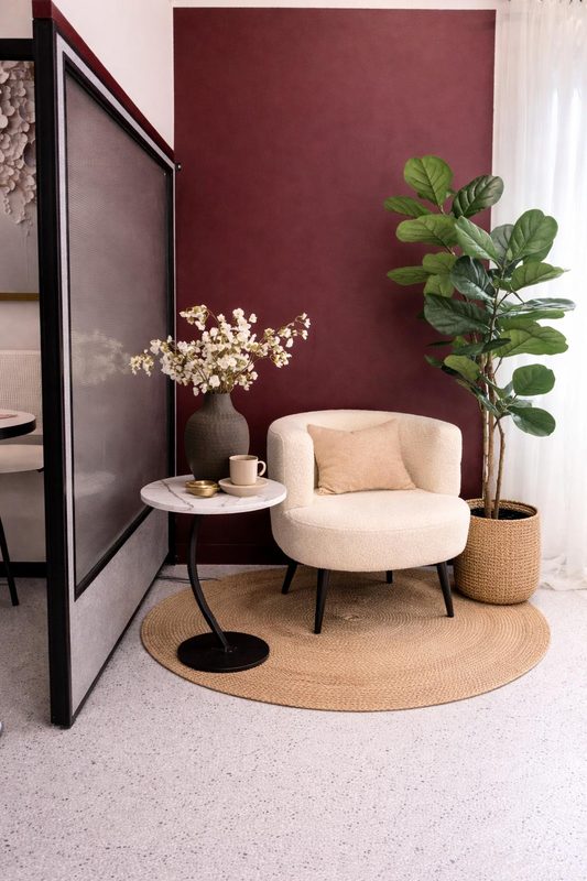 Burgundy corner bouclé chair